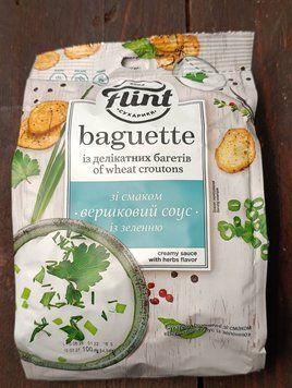 Сухарики пшеничні зі смаком " Вершковий соус із зеленню"  ТМ Flint baguette 100г фото